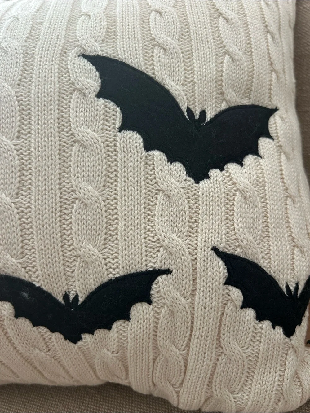 “New” Cupcakes & Cashmere Cream Cable-Knit Decorative Pillow with Black Bats